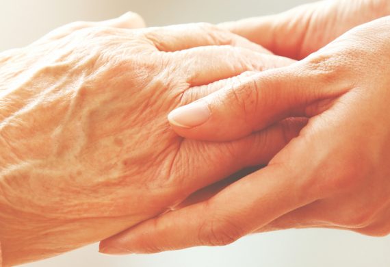 Close up of two hands holding