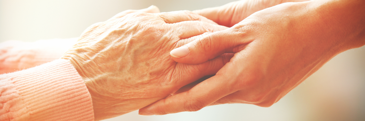 Close up of two hands holding